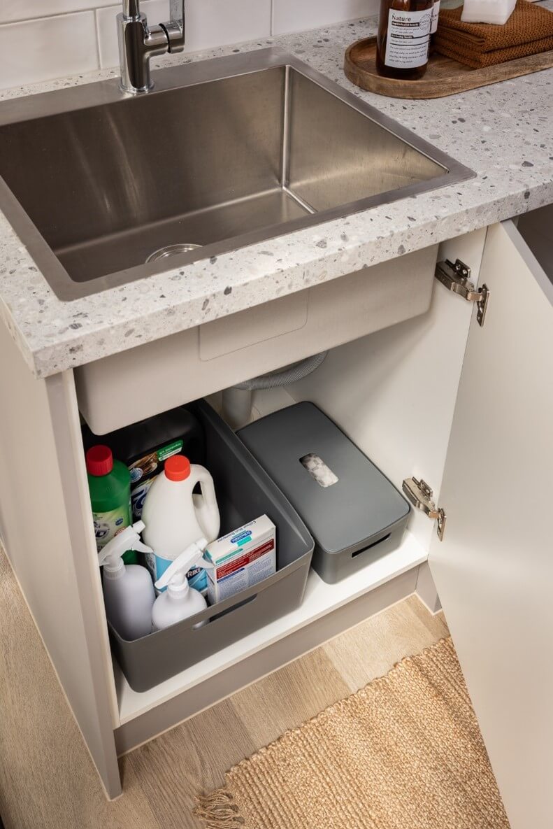 Under Sink Storage Ideas A popular location for storing cleaning supplies, such as sprays, detergents and cloths, is the cupboard underneath the sink. Over time, products you no longer need can consume this under sink area, making it look cluttered and untidy. Here are some easy organisation hacks to help you reclaim this space. Declutter The Space First Before organising the space under your sink, take everything out and declutter. Discard expired products, empty bottles or items you no longer use. This will give you a clean slate to work with. Make sure you wipe down the inside of the cupboard to remove dust or grime before you start placing items back in. Invest In Containers for Storage Inabox containers come in a range of different stackable sizes, making them the perfect choice when organising your products and maximising a small area. Our stylish Modular Containers range from 5 – 28 litres, meaning that there is a size to fit any space. The containers can be nested within each other, making vertical storage a breeze. Utilise The Door for Storage Utilising the doors for additional storage can be a game changer. You can install hooks on the inside of your doors to hang gloves or dish cloths for easy access. Group Items Together Divide your items into similar groups such as dishwashing supplies, trash bags, dish cloths for an additional storage solution to take your Modular Containers further, place smaller items like plugs, dishwashing tablets or tea towels into our Insert Trays. Regular Maintenance Set aside time every few months to reassess and reorganise the space under your sink. Dispose of any expired products, rearrange items as needed, and maintain the organisation system you've implemented. Don’t be a stranger! For more tips and tricks for styling your home, visit our blog or follow us on Instagram, Facebook and Pinterest. 